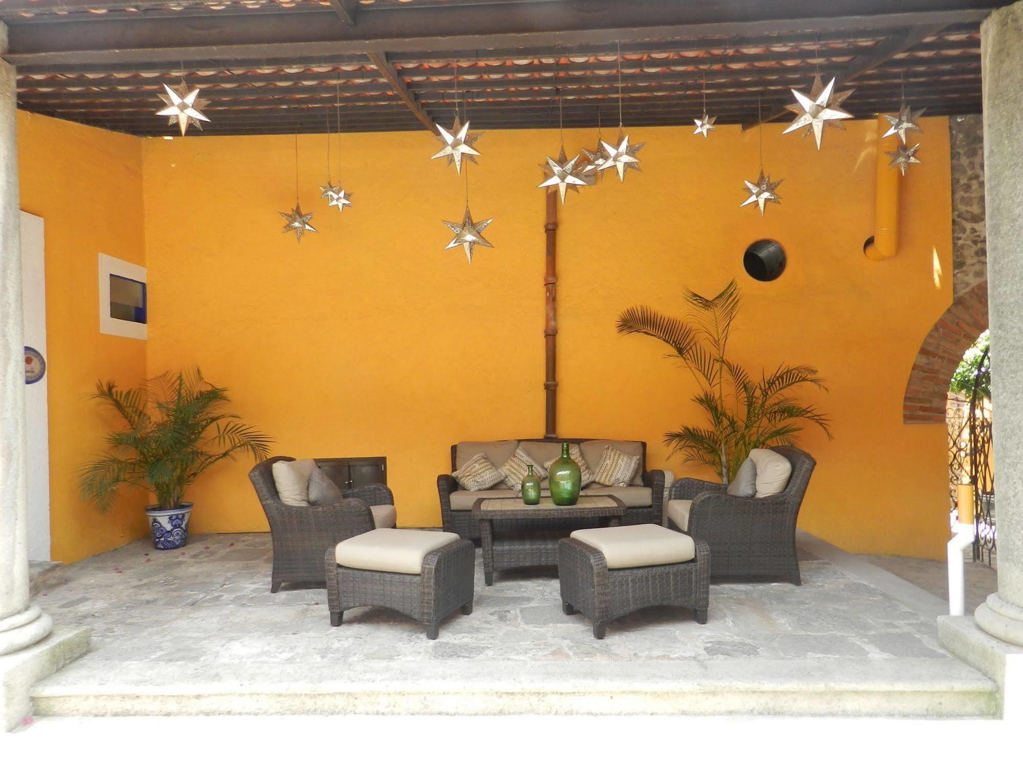 Collection O Al Otro Lado Del Rio, Puebla Hotel ภายนอก รูปภาพ Interior of a typical house in San Cristóbal de Las Casas
