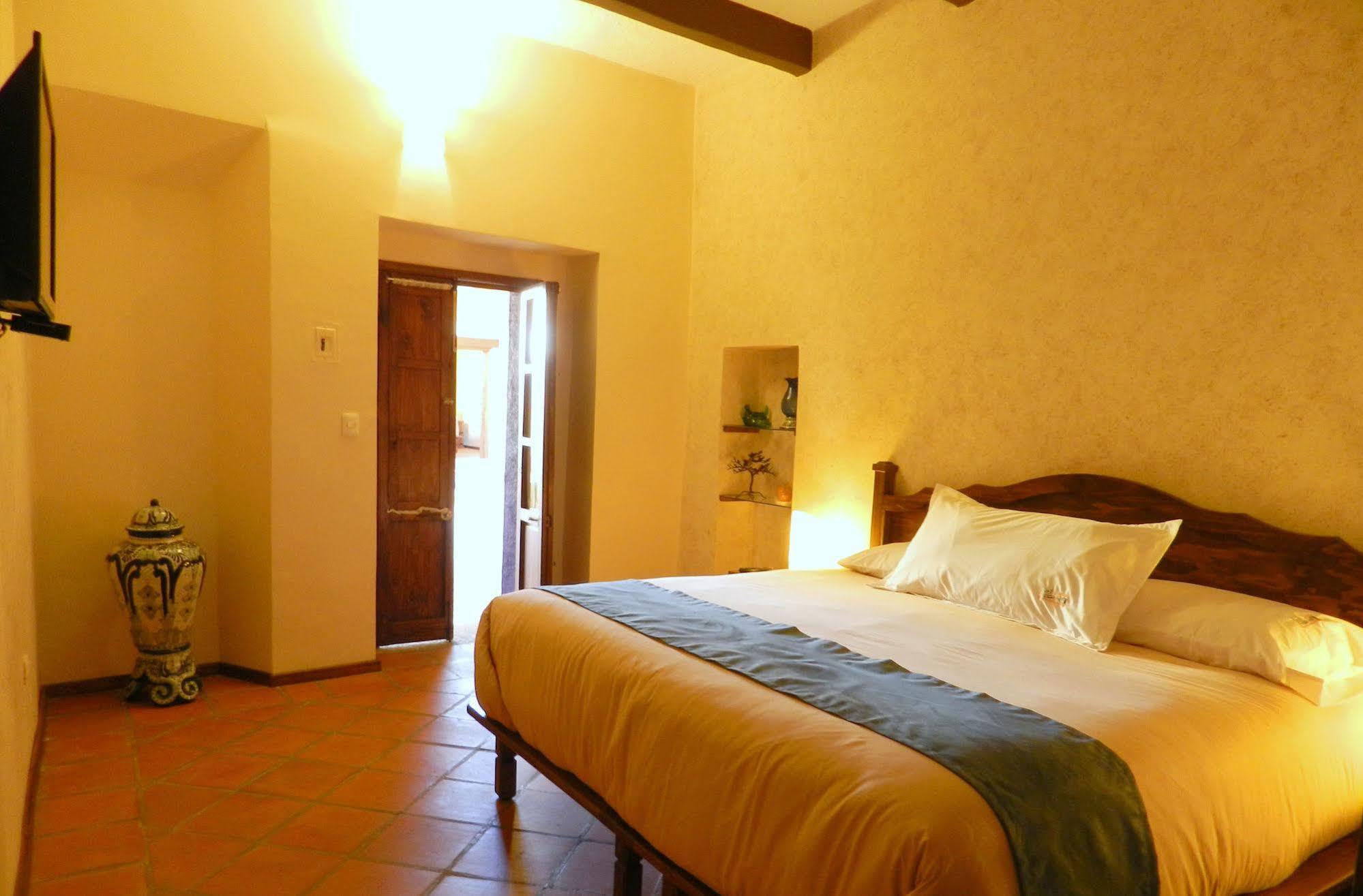 Collection O Al Otro Lado Del Rio, Puebla Hotel ภายนอก รูปภาพ A room at the hotel