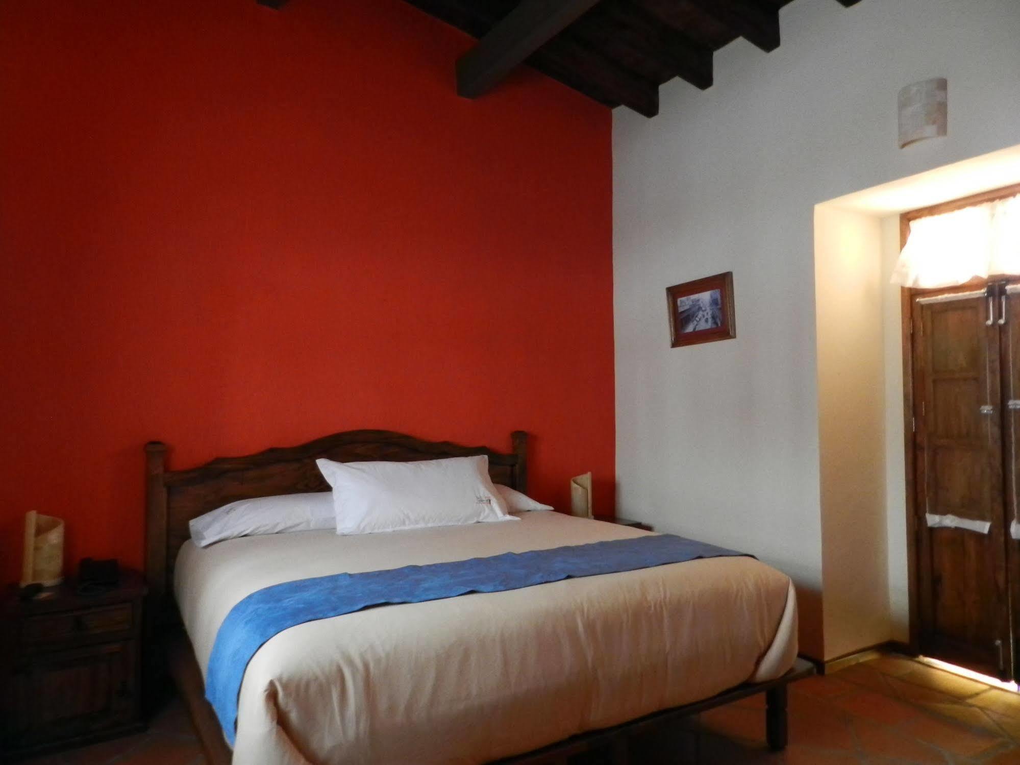 Collection O Al Otro Lado Del Rio, Puebla Hotel ภายนอก รูปภาพ A room at the hotel