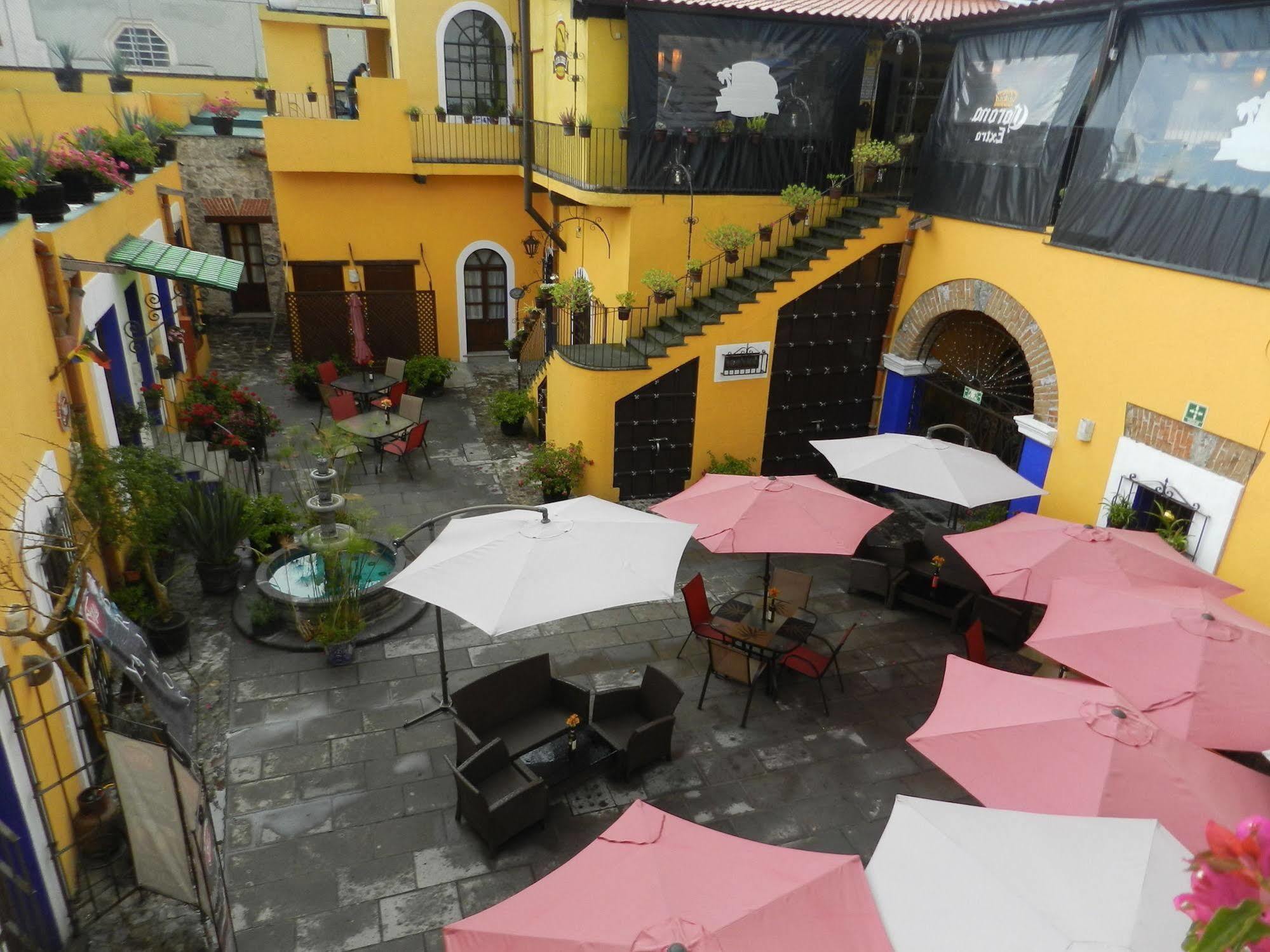 Collection O Al Otro Lado Del Rio, Puebla Hotel ภายนอก รูปภาพ Patio of the restaurant
