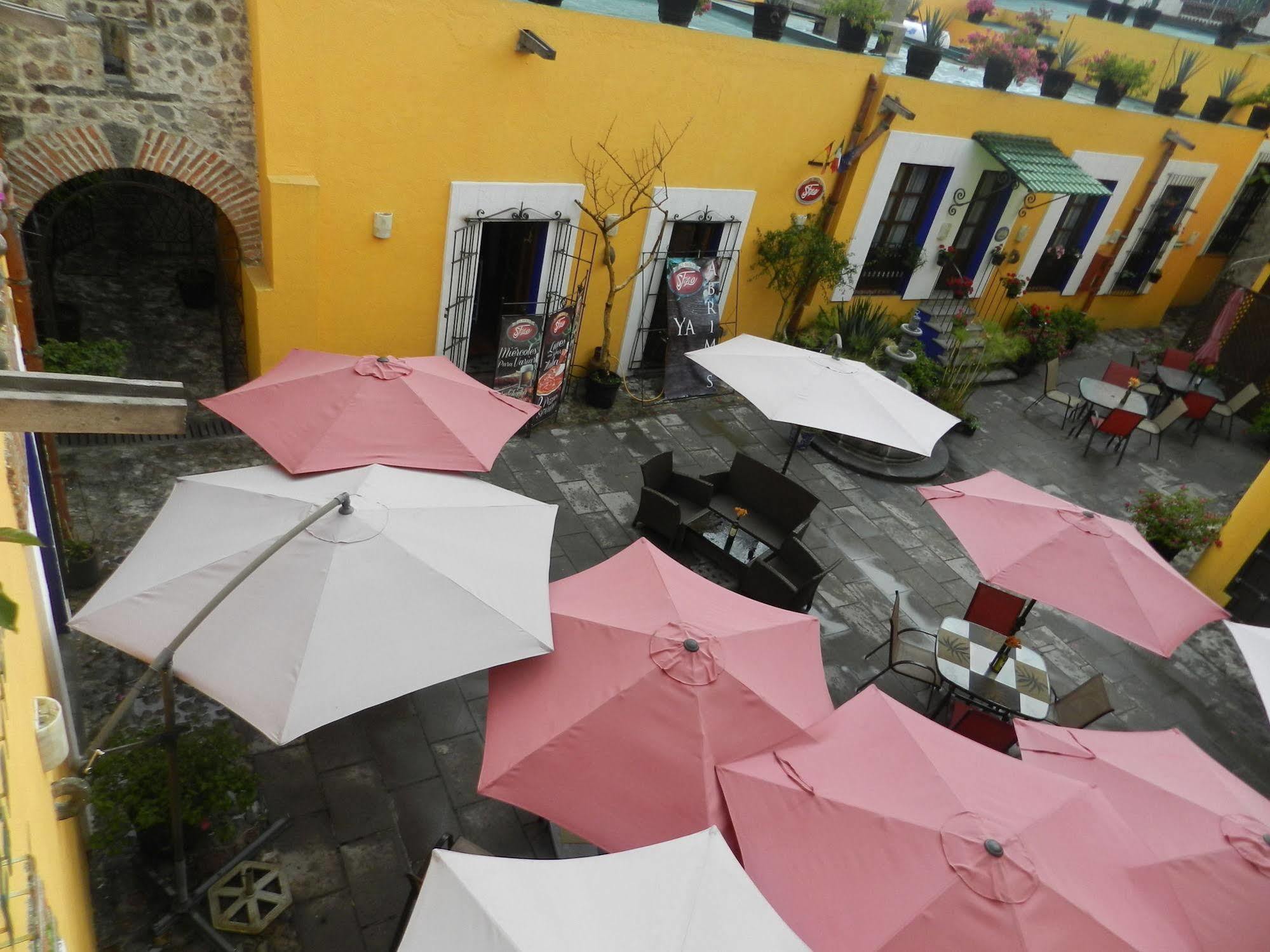 Collection O Al Otro Lado Del Rio, Puebla Hotel ภายนอก รูปภาพ Patio of the Casa de Morelos